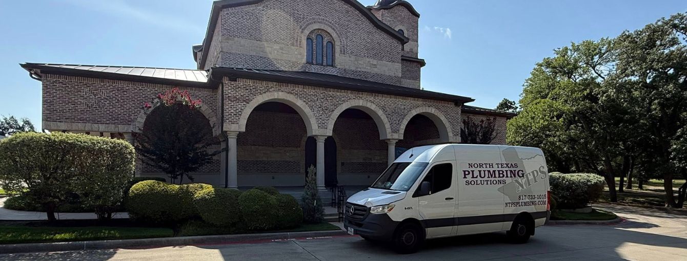 North Texas Plumbing Solutions Truck in front of a Church.