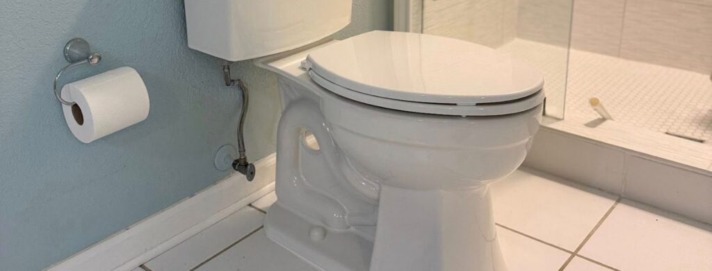 A new toilet installed into a home.