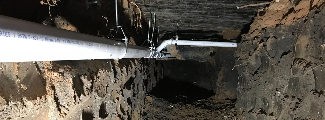 Pipes underneath a house.
