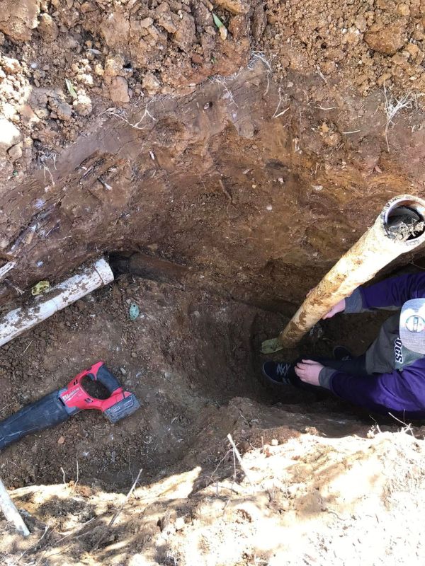 Repiping some worn out pipes in the ground. 